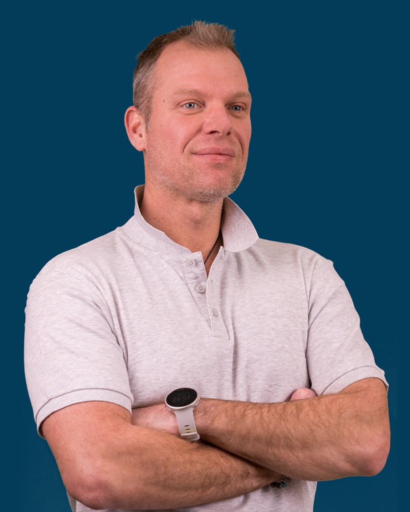 balazs corporate photo with blue background